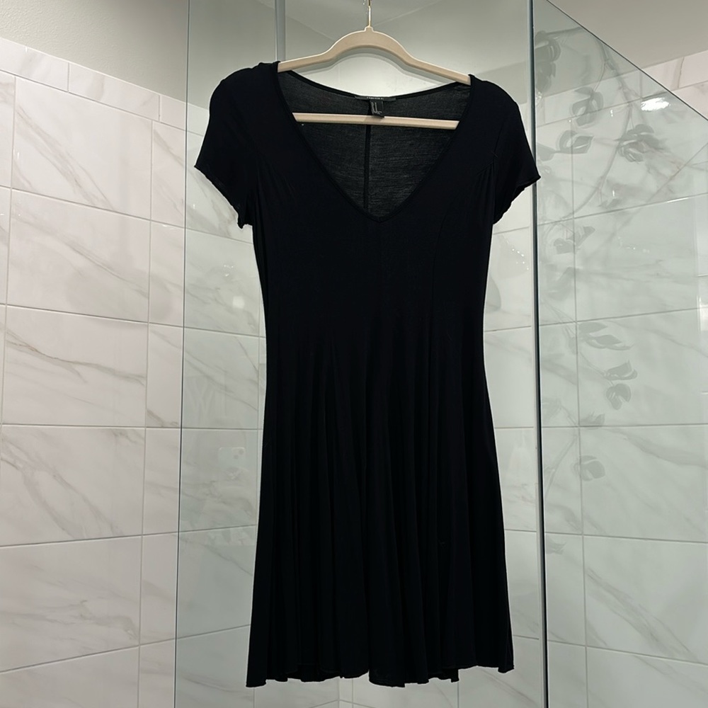 Forever 21 fitted black dress with flowy skirt and plunging neckline